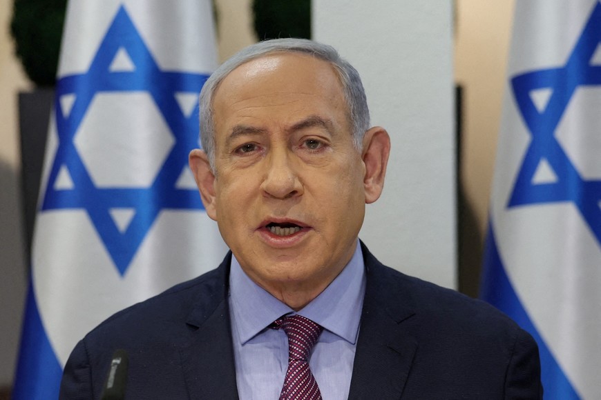 FILE PHOTO: Israeli Prime Minister Benjamin Netanyahu attends the weekly cabinet meeting at the the Kirya military base in Tel Aviv, Israel, 31 December 2023.    ABIR SULTAN/Pool via REUTERS/File Photo