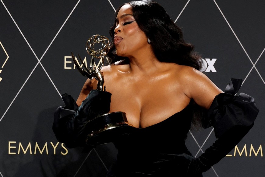 Niecy Nash-Betts poses with the Supporting Actress in a Limited/Anthology Series or Movie award for