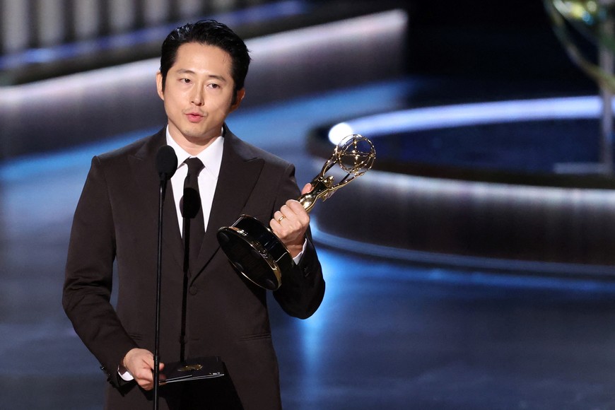 Steven Yeun accepts the Outstanding Lead Actor in a Limited or Anthology Series or Movie award for