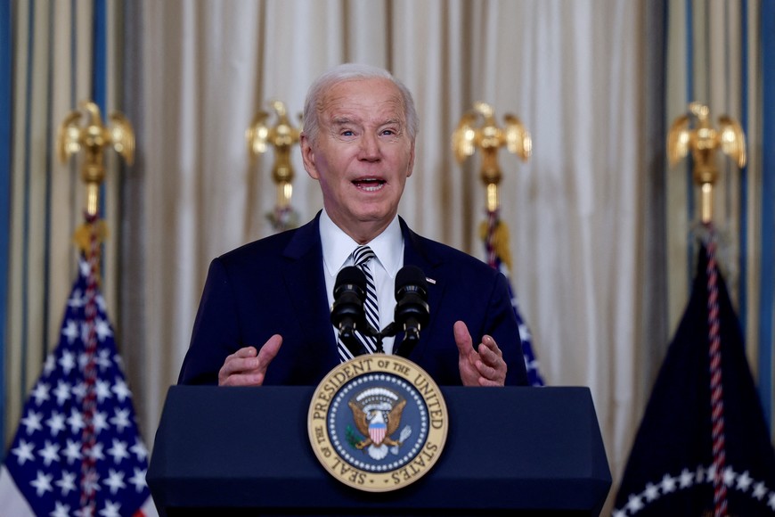 U.S. President Joe Biden delivers remarks ahead of a meeting with his Task Force on Reproductive Healthcare Access to mark the 51st anniversary of the landmark Roe v. Wade decision, in the State Dining Room at the White House in Washington, U.S., January 22, 2024. REUTERS/Evelyn Hockstein