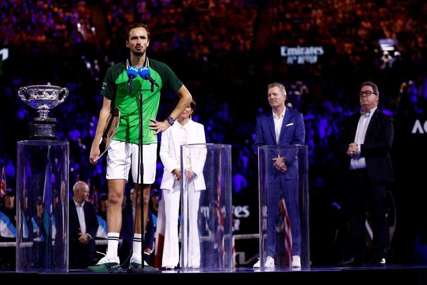 Tennis - Australian Open - Melbourne Park, Melbourne, Australia - January 28, 2024
Russia's Daniil Medvedev gives a speech holding the runners up trophy after losing the final against Italy's Jannik Sinner REUTERS/Issei Kato