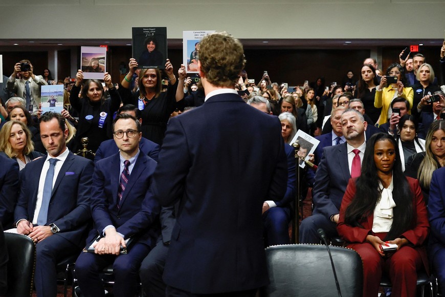 Meta's CEO Mark Zuckerberg stands and faces the audience as he testifies during the Senate Judiciary Committee hearing on online child sexual exploitation at the U.S. Capitol in Washington, U.S., January 31, 2024. REUTERS/Evelyn Hockstein