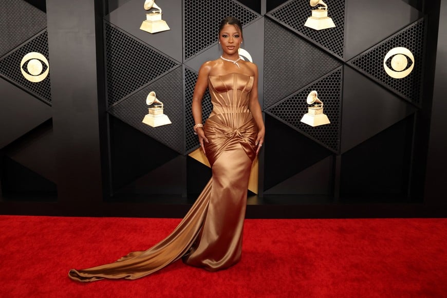 Victoria Monet poses on the red carpet as she attends the 66th Annual Grammy Awards in Los Angeles, California, U.S., February 4, 2024. REUTERS/Mario Anzuoni