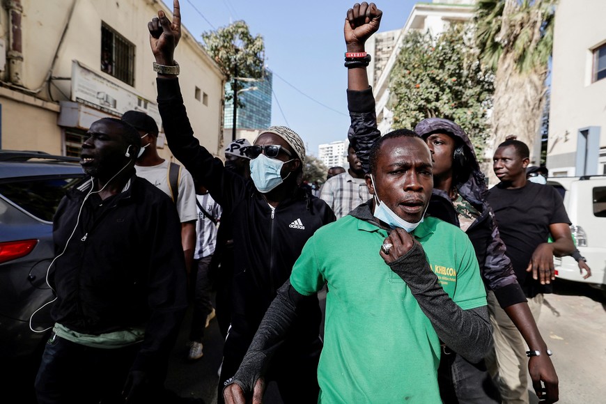 Senegalese demonstrators shout slogans after they were pushed back  by riot police while they to  tried to gather to protest the postponement of the February 25 presidential election, near  Senegal's National Assembly in Dakar, Senegal February 5, 2024. REUTERS/Zohra Bensemra