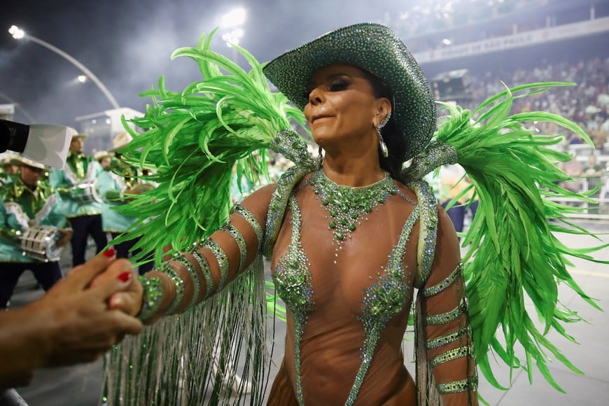 A reveller from Mancha Verde school performs during the first night of the Carnival parade at Anhembi Sambadrome in Sao Paulo, Brazil February 10, 2024. REUTERS/Carla Carniel
