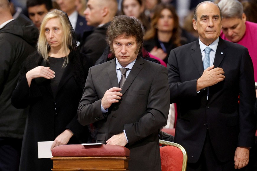 Argentina's President Javier Milei makes a cross sign as Pope Francis presides over canonisation celebrations of Maria Antonia de Paz y Figueroa, an Argentine consecrated lay woman, in St. Peter's Basilica at the Vatican, February 11, 2024. REUTERS/Remo Casilli