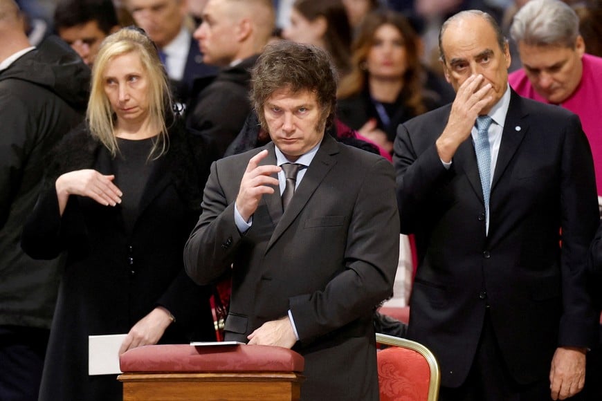 Argentina's President Javier Milei makes a cross sign as Pope Francis presides over canonisation celebrations of Maria Antonia de Paz y Figueroa, an Argentine consecrated lay woman, in St. Peter's Basilica at the Vatican, February 11, 2024. REUTERS/Remo Casilli     TPX IMAGES OF THE DAY