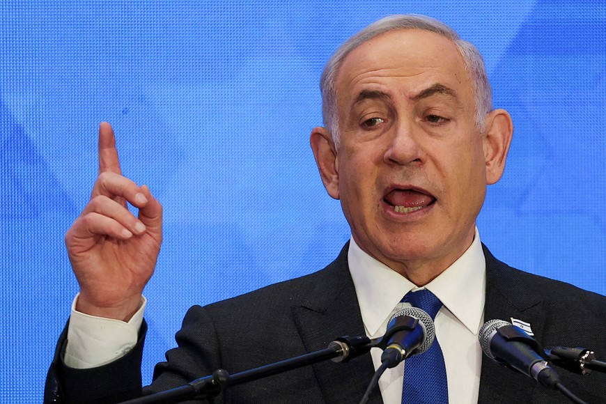 FILE PHOTO: Israeli Prime Minister Benjamin Netanyahu addresses the Conference of Presidents of Major American Jewish Organizations, amid the ongoing conflict between Israel and the Palestinian Islamist group Hamas, in Jerusalem, February 18, 2024. REUTERS/Ronen Zvulun/File Photo