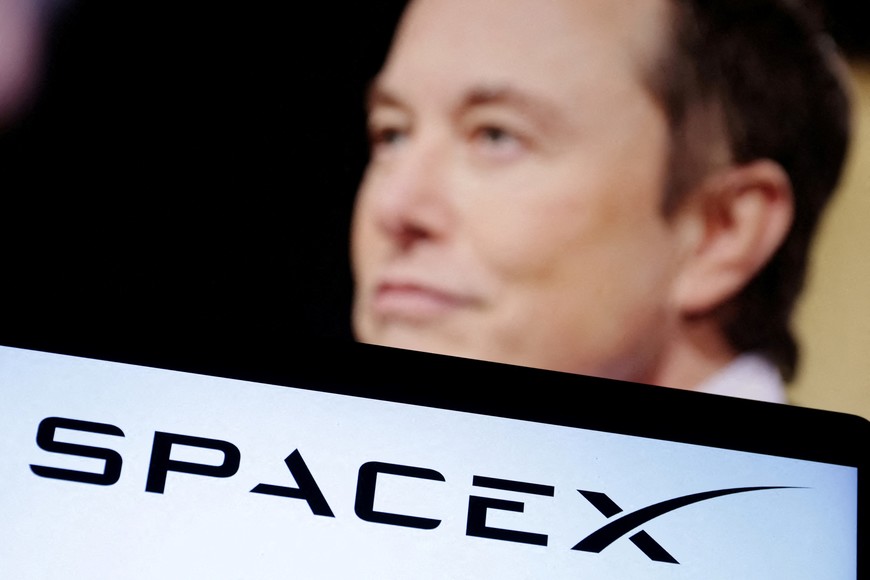 FILE PHOTO: SpaceX logo and Elon Musk photo are seen in this illustration taken, December 19, 2022. REUTERS/Dado Ruvic/Illustration/File Photo