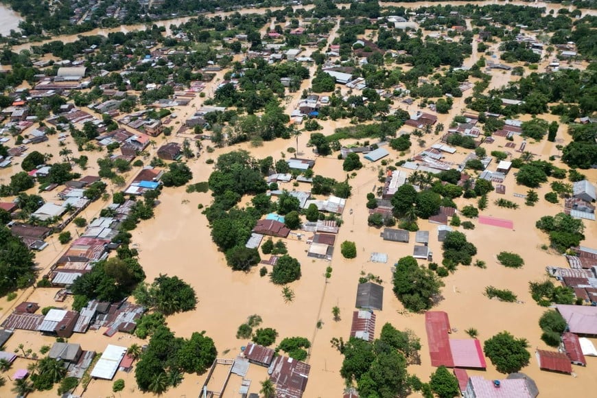Aerial view of houses and buildings submerged following flooding from heavy rain, causing the Acre River's bank to burst, in Cobija, Bolivia, in this still image released on February 27, 2024.   Dr Papito Richter - Gobernador/Handout via REUTERS    THIS IMAGE HAS BEEN SUPPLIED BY A THIRD PARTY. NO RESALES. NO ARCHIVES. MANDATORY CREDIT.