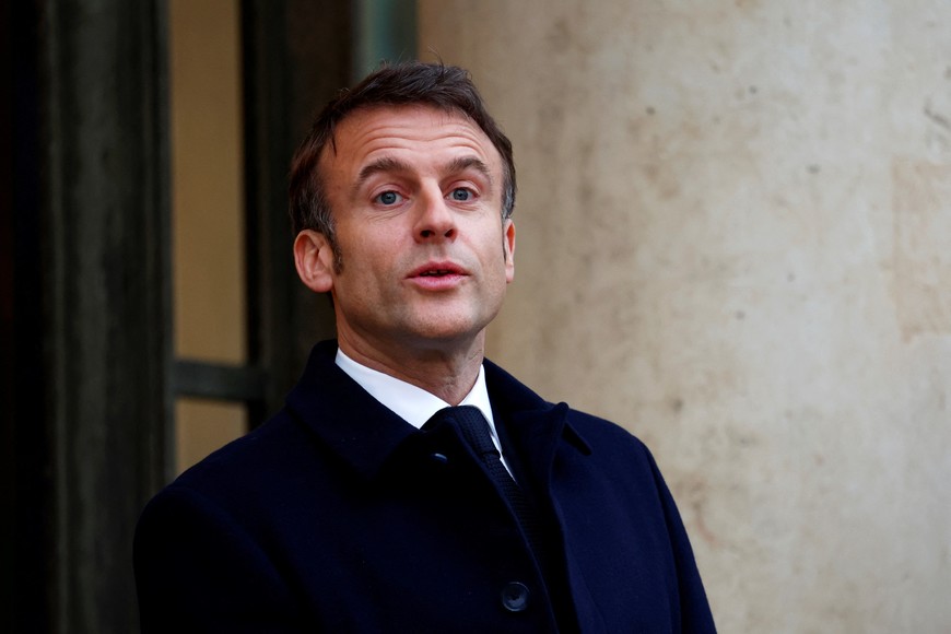 French President Emmanuel Macron reacts as he waits for guests arrivals for a conference in support of Ukraine with European leaders and government representatives at the Elysee Palace in Paris, France, February 26, 2024. REUTERS/Gonzalo Fuentes