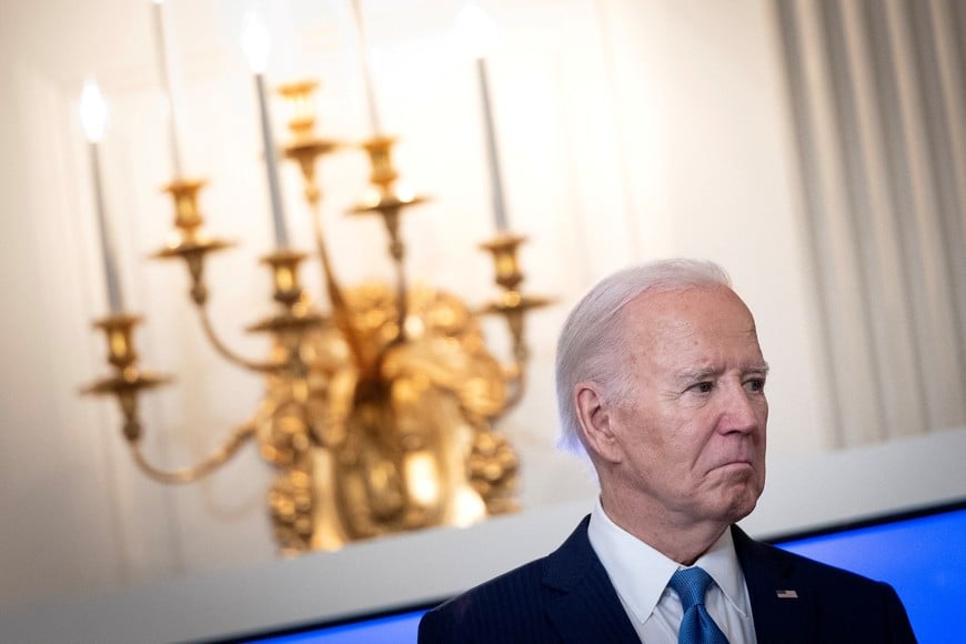 U.S. President Joe Biden looks on before speaking during a roundtable discussion on public safety at the State Dining Room at the White House in Washington, U.S., February 28, 2024. REUTERS/Tom Brenner