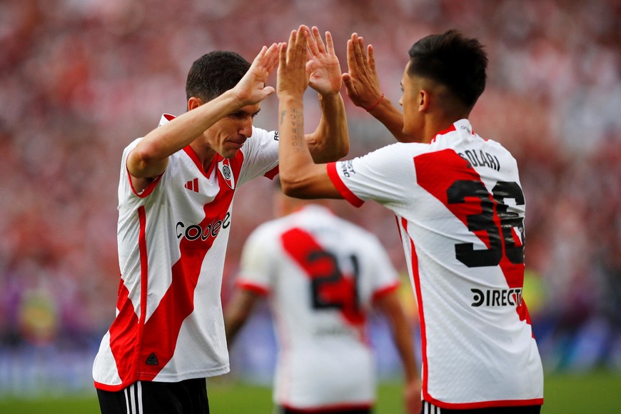 Soccer Football - Primera Division - River Plate v Boca Juniors - Estadio Mas Monumental, Buenos Aires, Argentina - February 25, 2024
River Plate's Pablo Solari celebrates scoring their first goal with Ignacio Fernandez REUTERS/Cristina Sille
