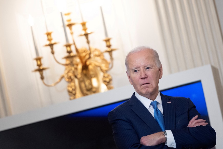 U.S. President Joe Biden looks on before speaking during a roundtable discussion on public safety at the State Dining Room at the White House in Washington, U.S., February 28, 2024. REUTERS/Tom Brenner