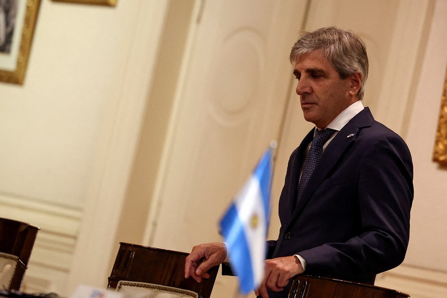 FILE PHOTO: Argentina's Economy Minister Luis Caputo looks on as U.S. Secretary of State Antony Blinken (not pictured) visits the Casa Rosada Presidential Palace in Buenos Aires, Argentina February 23, 2024. REUTERS/Agustin Marcarian/Pool/File Photo