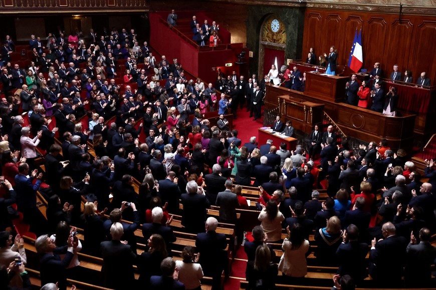 View of the Versailles' hemicycle as French lawmakers applaud after they enshrined the right to abortion in its constitution, during a special congress gathering both the upper and lower houses of the French parliament (National Assembly and Senate), at the Versailles Palace near Paris, France, March 4, 2024. REUTERS/Stephanie Lecocq
