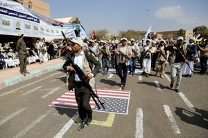State servants parade following 12 days of military training they have received as part of a mobilization campaign by the Houthis in Sanaa, Yemen March 9, 2024. REUTERS/Khaled Abdullah