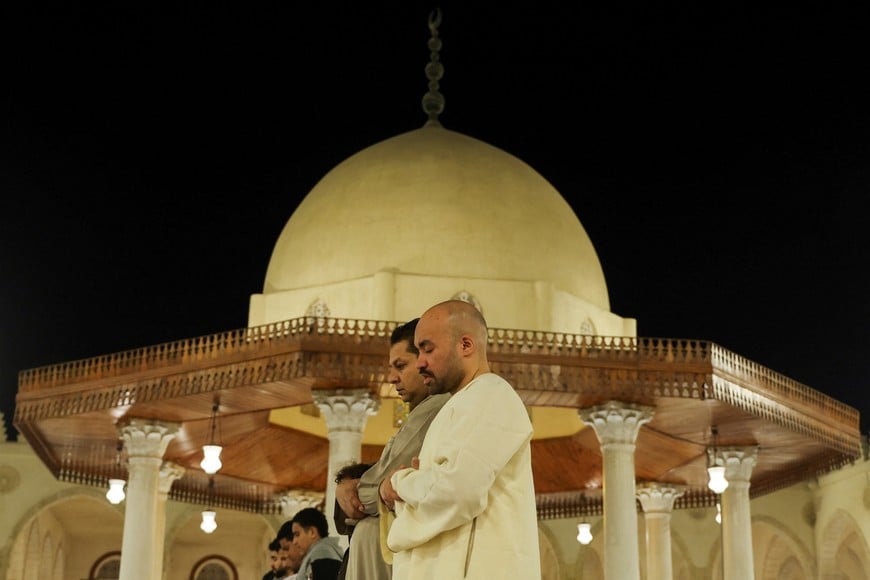 Muslim worshippers take part in evening prayers called "Tarawih" during the eve of the first night of the Muslim holy fasting month of Ramadan, at Amr Ibn El-Aas mosque, the first and oldest mosque ever built on the land of Egypt, in old Cairo, Egypt March 10, 2024. REUTERS/Amr Abdallah Dalsh