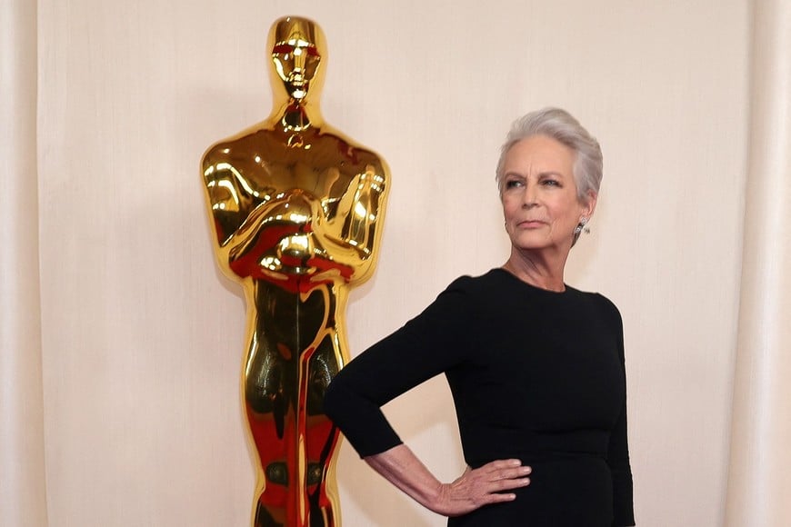 Jamie Lee Curtis poses on the red carpet during the Oscars arrivals at the 96th Academy Awards in Hollywood, Los Angeles, California, U.S., March 10, 2024. REUTERS/Aude Guerrucci