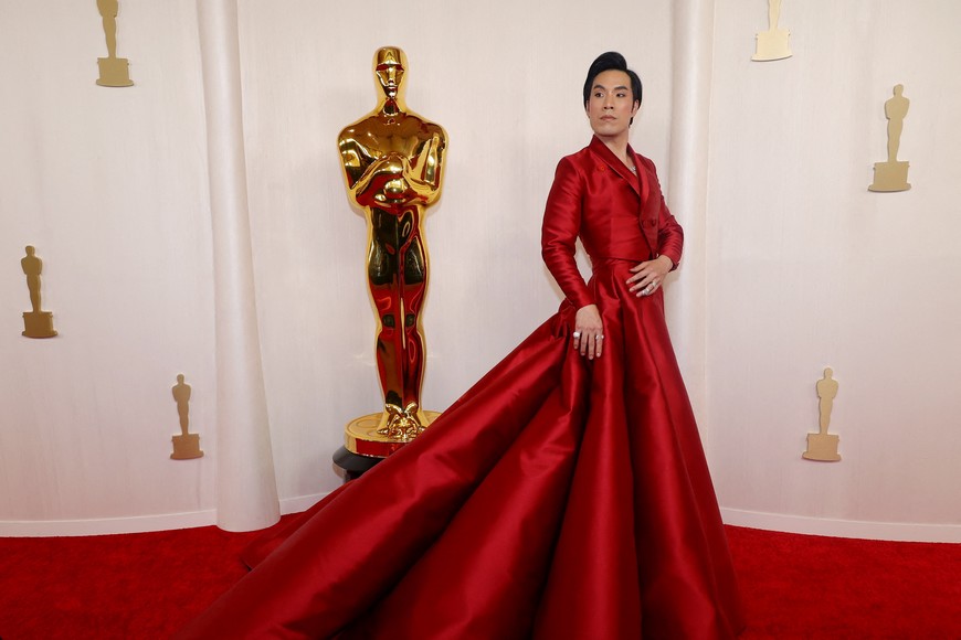 Eugene Lee Yang poses on the red carpet during the Oscars arrivals at the 96th Academy Awards in Hollywood, Los Angeles, California, U.S., March 10, 2024. REUTERS/Aude Guerrucci