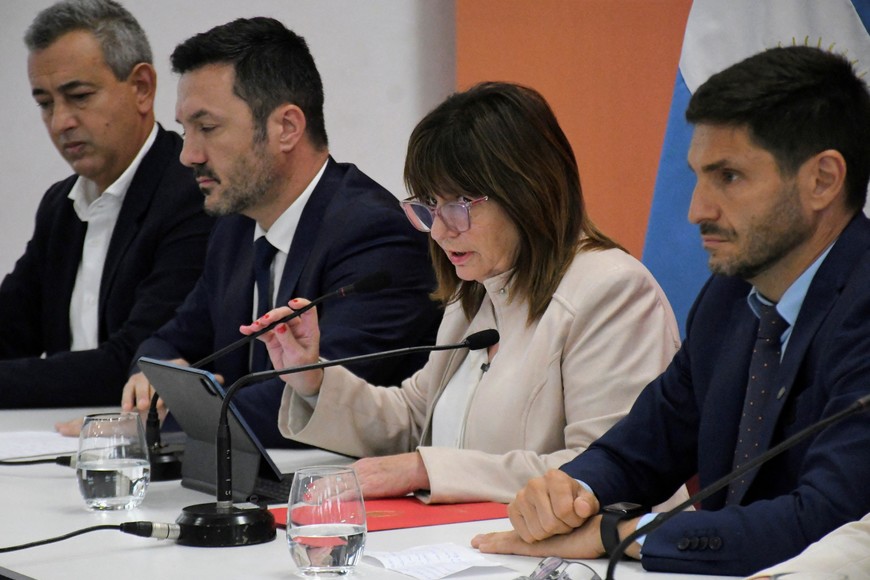 Argentina's Security Minister Patricia Bullrich speaks next to Defense Minister Luis Petri, Rosario's Mayor, Pablo Javkin, and Santa Fe's Governor, Maximiliano Pullaro, during a press conference to announce that federal forces will be sent to the city of Rosario to confront drug gangs, in Rosario, Argentina March 11, 2024. REUTERS/Stringer
