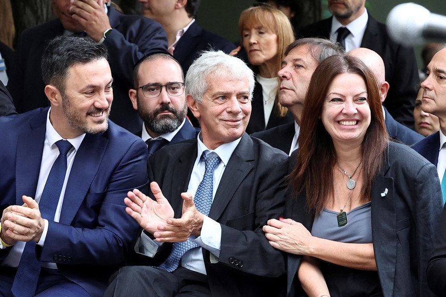 Argentine Defense Minister Luis Petri, Justice Minister Mariano Cuneo Libarona and Minister of Human Capital Sandra Pettovello attend a ceremony, to pay homage to the victims of the 1992 Israeli embassy bombing, in Buenos Aires, Argentina, March 18, 2024. REUTERS/Agustin Marcarian