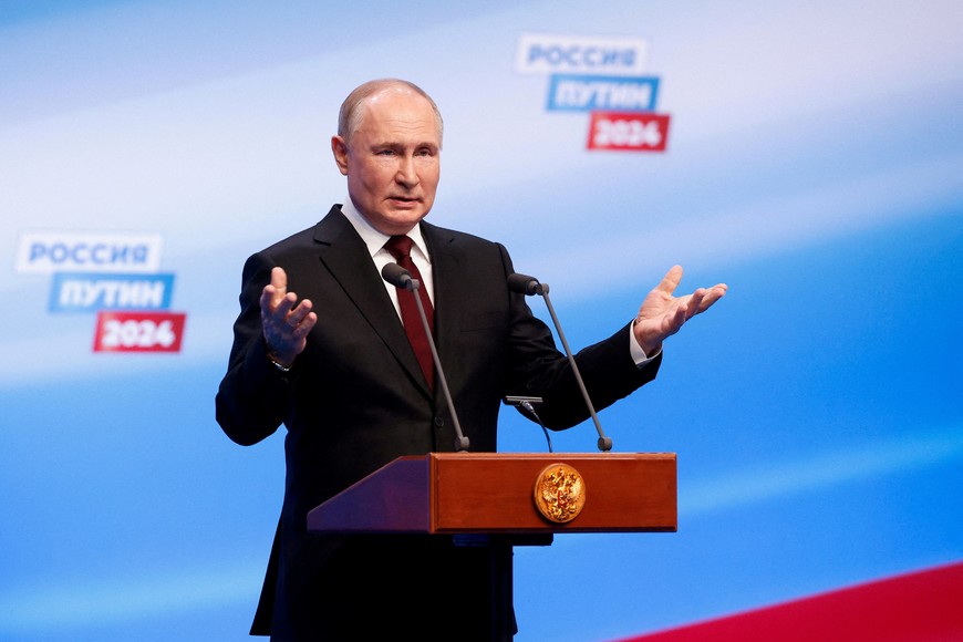 Russian presidential candidate and incumbent President Vladimir Putin speaks at his election campaign headquarters, after polling stations closed on the final day of the presidential election in Moscow, Russia, March 17, 2024. REUTERS/Maxim Shemetov