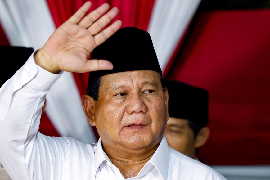 Indonesia's front-runner presidential candidate and Defence Minister Prabowo Subianto waves as he delivers his speech after the country's election commission announced last month's presidential election result, in Jakarta, Indonesia, March 20, 2024. REUTERS/Willy Kurniawan