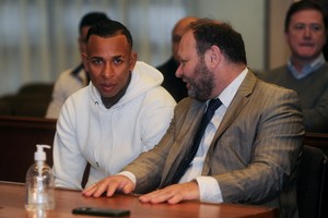 Colombian Boca Juniors' striker, Sebastian Villa, listens to justice reading a sentence to prison in Argentina on gender violence charges, next to his lawyer Martin Apolo, in a courtroom in Buenos Aires, Argentina June 2, 2023.REUTERS/Cristina Sille REFILE - QUALITY REPEAT