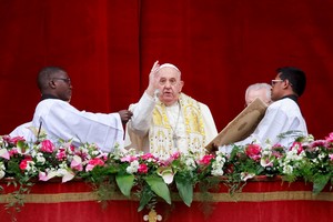 Pope Francis delivers his "Urbi et Orbi" (To the city and the world) message at St. Peter's Square, on Easter Sunday, at the Vatican March 31, 2024. REUTERS/Yara Nardi     TPX IMAGES OF THE DAY