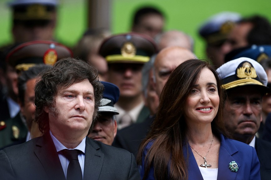 Argentina's President Javier Milei and Vice President Victoria Villarruel attend a ceremony to honour victims of the 1982 war between Britain and Argentina in the Falkland Islands, known to Argentines as Malvinas, at a war memorial with names of killed Argentinian soldiers, marking the 42nd anniversary of the conflict, in Buenos Aires, Argentina, April 2, 2024. REUTERS/Agustin Marcarian