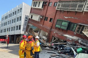 Firefighters work at the site where a building collapsed following the earthquake, in Hualien, Taiwan, in this handout provided by Taiwan's National Fire Agency on April 3, 2024. Taiwan National Fire Agency/Handout via REUTERS  ATTENTION EDITORS - THIS IMAGE WAS PROVIDED BY A THIRD PARTY. NO RESALES. NO ARCHIVES.