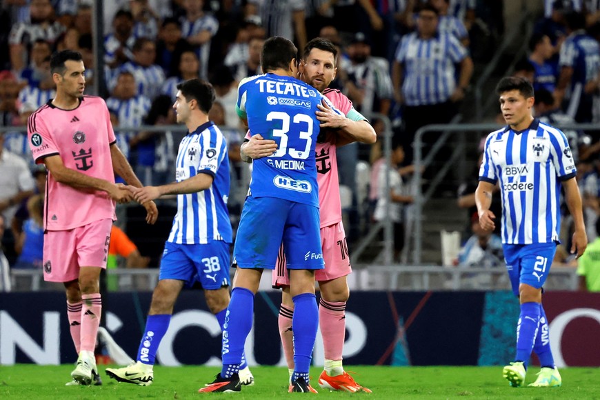 Soccer Football - CONCACAF Champions Cup - Quarter Final - Second Leg - Monterrey v Inter Miami - Estadio BBVA, Monterrey, Mexico - April 10, 2024
Inter Miami's Lionel Messi and Monterrey's Stefan Medina after the match REUTERS/Daniel Becerril