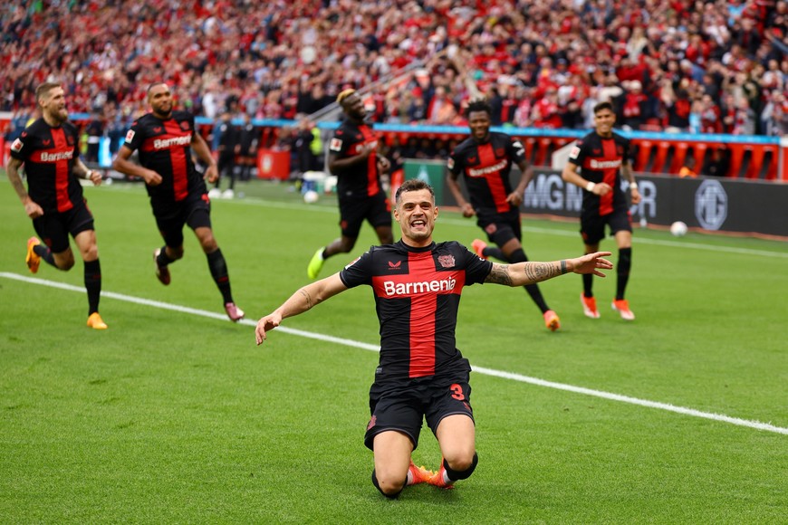 Soccer Football - Bundesliga - Bayer Leverkusen v Werder Bremen - BayArena, Leverkusen, Germany - April 14, 2024
Bayer Leverkusen's Granit Xhaka celebrates scoring their second goal REUTERS/Kai Pfaffenbach DFL REGULATIONS PROHIBIT ANY USE OF PHOTOGRAPHS AS IMAGE SEQUENCES AND/OR QUASI-VIDEO.