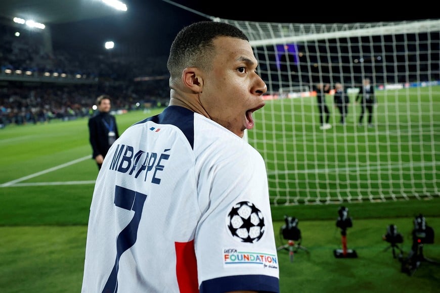 Soccer Football - Champions League - Quarter Final - Second Leg - FC Barcelona v Paris St Germain - Estadi Olimpic Lluis Companys, Barcelona, Spain - April 16, 2024
Paris St Germain's Kylian Mbappe celebrates after the match REUTERS/Juan Medina     TPX IMAGES OF THE DAY