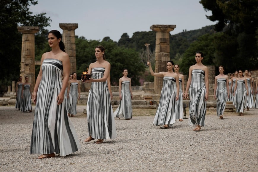 Paris 2024 Olympics - Olympic Flame Lighting Ceremony - Ancient Olympia, Greece - April 16, 2024
Greek actress Mary Mina, playing the role of High Priestess, carries the torch during the Olympic Flame lighting ceremony for the Paris 2024 Olympics. REUTERS/Alkis Konstantinidis