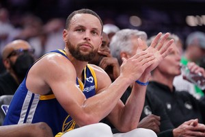 Apr 16, 2024; Sacramento, California, USA; Golden State Warriors guard Stephen Curry (30) sits on the bench during action against the Sacramento Kings in the fourth quarter during a play-in game of the 2024 NBA playoffs at the Golden 1 Center. Mandatory Credit: Cary Edmondson-USA TODAY Sports