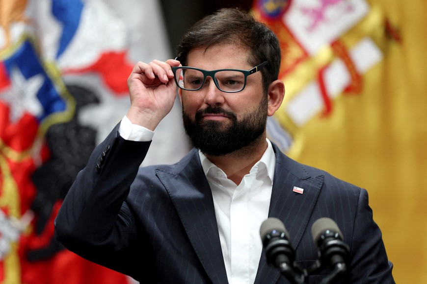 FILE PHOTO: Chile's President Gabriel Boric listens a question at La Moneda government house in Santiago, Chile, March 8, 2024. REUTERS/Ivan Alvarado/File Photo