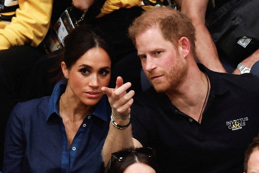 FILE PHOTO: FILE PHOTO: Britain's Prince Harry, Duke of Sussex and his wife Meghan, Duchess of Sussex, attend the sitting volleyball finals at the 2023 Invictus Games, an international multi-sport event for injured soldiers, in Duesseldorf, Germany September 15, 2023. REUTERS/Piroschka Van De Wouw/File Photo/File Photo