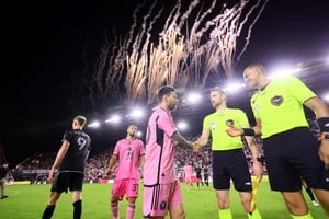 Apr 20, 2024; Fort Lauderdale, Florida, USA; Inter Miami CF forward Lionel Messi (10) shakes hand with officials after the game against Nashville SC at Chase Stadium. Mandatory Credit: Sam Navarro-USA TODAY Sports