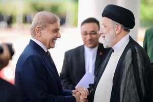 Pakistan's Prime Minister Shehbaz Sharif greets Iranian President Ebrahim Raisi on his three-day official visit in Islamabad, Pakistan April 22, 2024. Prime Minister Office/Handout via REUTERS ATTENTION EDITORS - THIS PICTURE WAS PROVIDED BY A THIRD PARTY. NO RESALES. NO ARCHIVES.