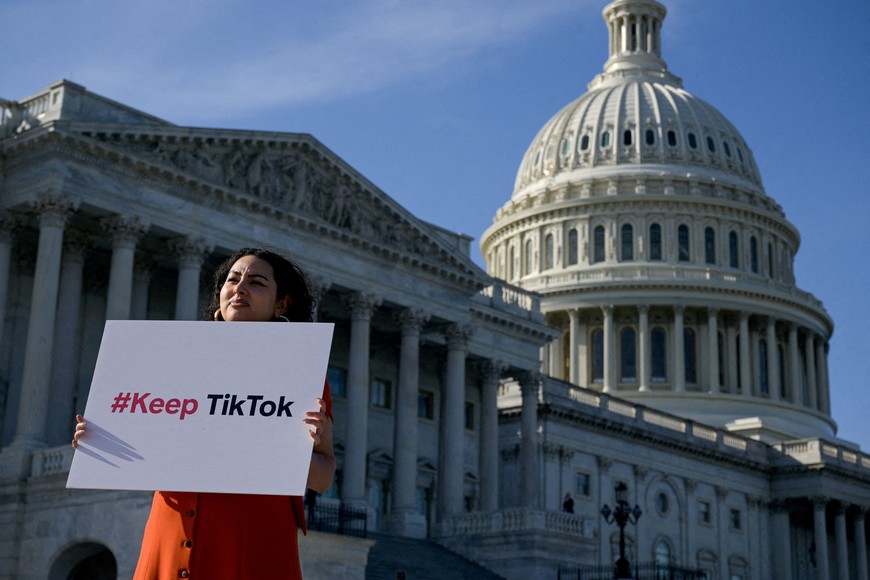 FILE PHOTO: Giovanna Gonzalez of Chicago demonstrates outside the U.S. Capitol following a press conference by TikTok creators to voice their opposition to the “Protecting Americans from Foreign Adversary Controlled Applications Act," pending crackdown legislation on TikTok in the House of Representatives, on Capitol Hill in Washington, U.S., March 12, 2024. REUTERS/Craig Hudson/File Photo