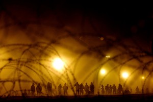 Migrants stand near the border wall during a sandstorm after having crossed the U.S.-Mexico border to turn themselves in to U.S. Border Patrol agents, as the U.S. prepares to lift COVID-19 era Title 42 restrictions that have blocked migrants at the border from seeking asylum since 2020, in El Paso, Texas, U.S., May 10, 2023. REUTERS/Jose Luis Gonzalez           SEARCH "GLOBAL POY 2023" FOR THIS STORY. SEARCH "REUTERS POY" FOR ALL BEST OF 2023 PACKAGES.        TPX IMAGES OF THE DAY