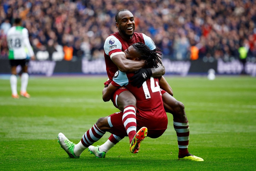 Soccer Football - Premier League - West Ham United v Liverpool - London Stadium, London, Britain - April 27, 2024
West Ham United's Michail Antonio celebrates scoring their second goal with Mohammed Kudus Action Images via Reuters/John Sibley NO USE WITH UNAUTHORIZED AUDIO, VIDEO, DATA, FIXTURE LISTS, CLUB/LEAGUE LOGOS OR 'LIVE' SERVICES. ONLINE IN-MATCH USE LIMITED TO 45 IMAGES, NO VIDEO EMULATION. NO USE IN BETTING, GAMES OR SINGLE CLUB/LEAGUE/PLAYER PUBLICATIONS.     TPX IMAGES OF THE DAY