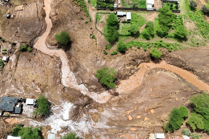 A drone view shows damaged houses after heavy flash floods wiped out several homes when a dam burst, following heavy rains in Kamuchiri village of Mai Mahiu, Nakuru County, Kenya April 29, 2024. REUTERS/Edwin Waita