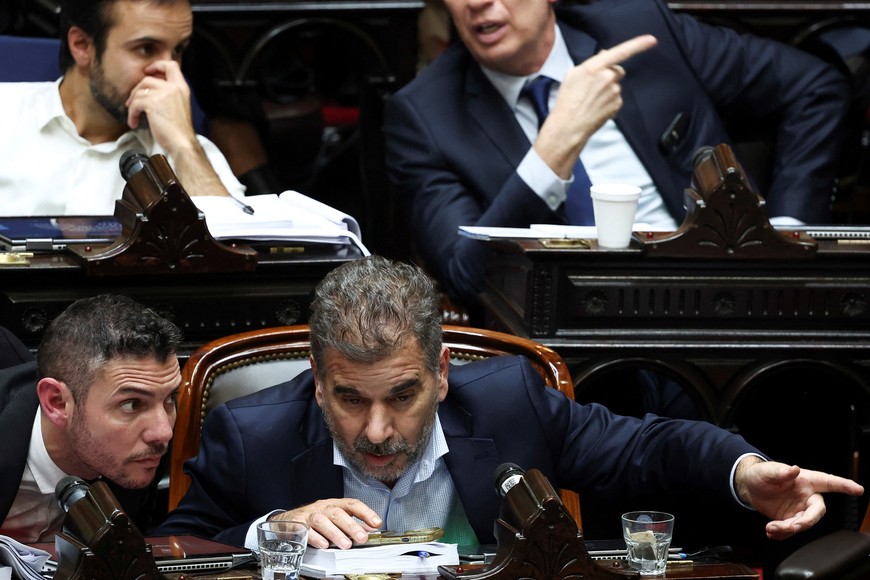 Lawmakers Damian Arabia and Cristian Ritondo attend a debate on Argentina's President Javier Milei's reform bill, known as the "omnibus bill", at the National Congress, in Buenos Aires, Argentina, April 30, 2024. REUTERS/Agustin Marcarian