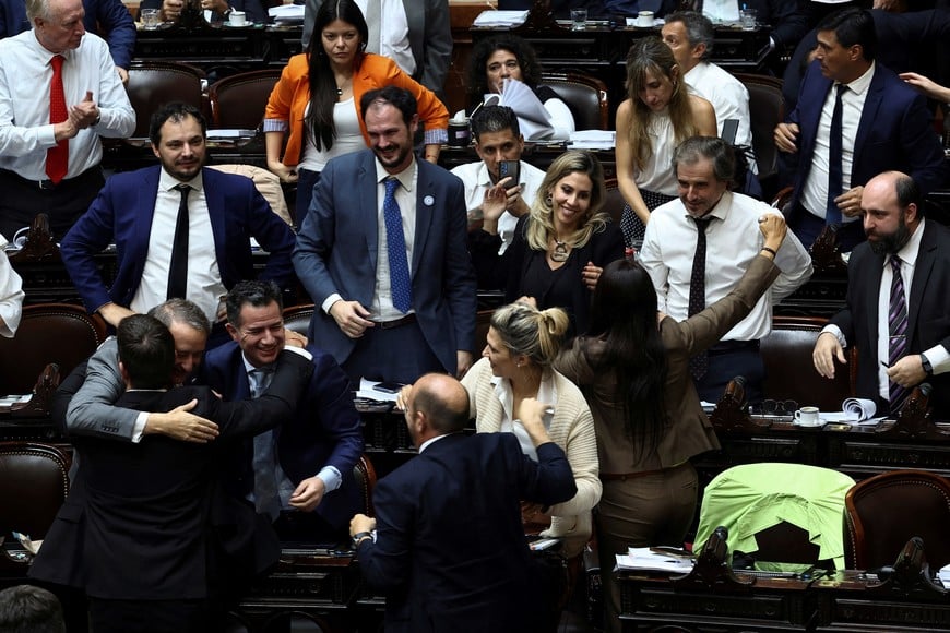 Lawmakers celebrate during the debate on Argentina's President Javier Milei's reform bill, known as the "omnibus bill", at the National Congress, in Buenos Aires, Argentina, April 30, 2024. REUTERS/Agustin Marcarian