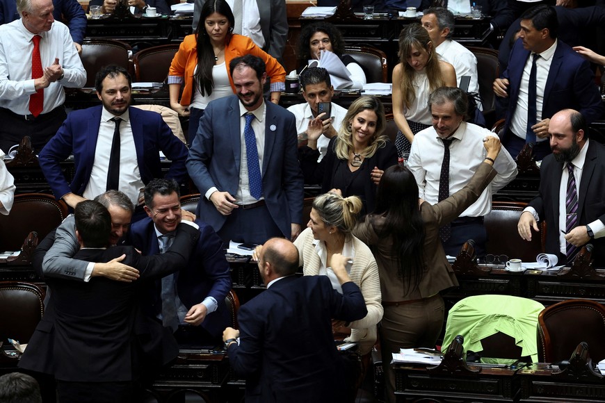 Lawmakers celebrate during the debate on Argentina's President Javier Milei's reform bill, known as the "omnibus bill", at the National Congress, in Buenos Aires, Argentina, April 30, 2024. REUTERS/Agustin Marcarian
