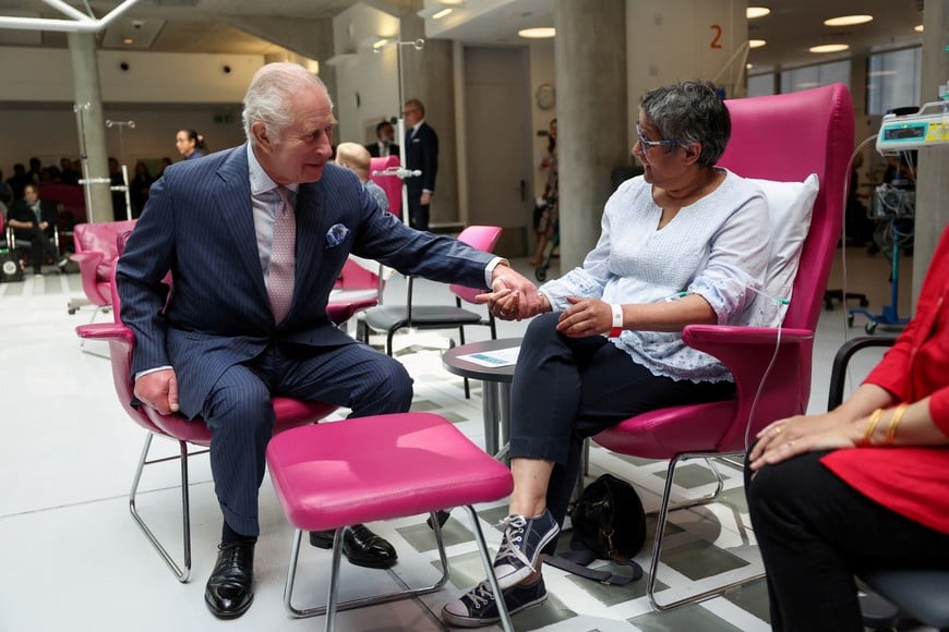 Britain's King Charles meets with patient Asha Millan during a visit to the University College Hospital Macmillan Cancer Centre in London, Britain, April 30, 2024. REUTERS/Suzanne Plunkett/Pool