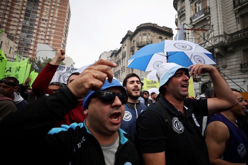 People react, as union members participate in a march during May Day celebrations, in Buenos Aires, Argentina, May 1, 2024. REUTERS/Agustin Marcarian